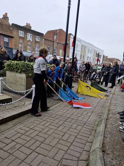 Emma standing next to our flag bearers