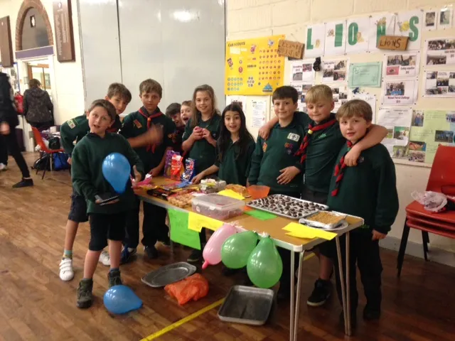 cubs around a stall